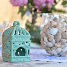 Lanterna in ceramica verde con conchiglie quadrata