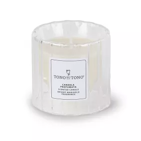 candela profumata in vetro trasparente