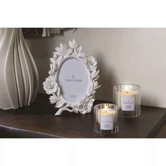 candele profumate in vasetto accese