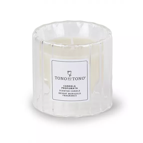 candela profumata in vetro trasparente